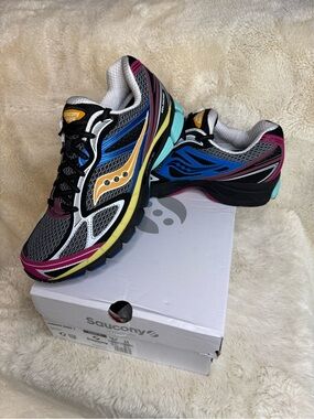 New in Box -Saucony Women's (size 12) / Men’s (size 10.5)